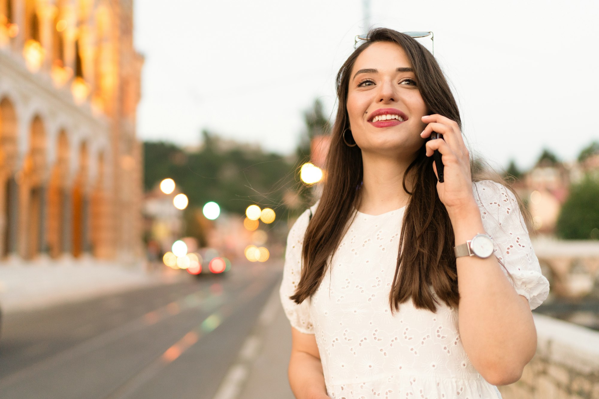 Young charming woman talking on the phone